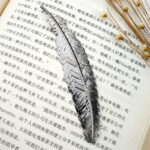 Bladwijzer met metalen pen